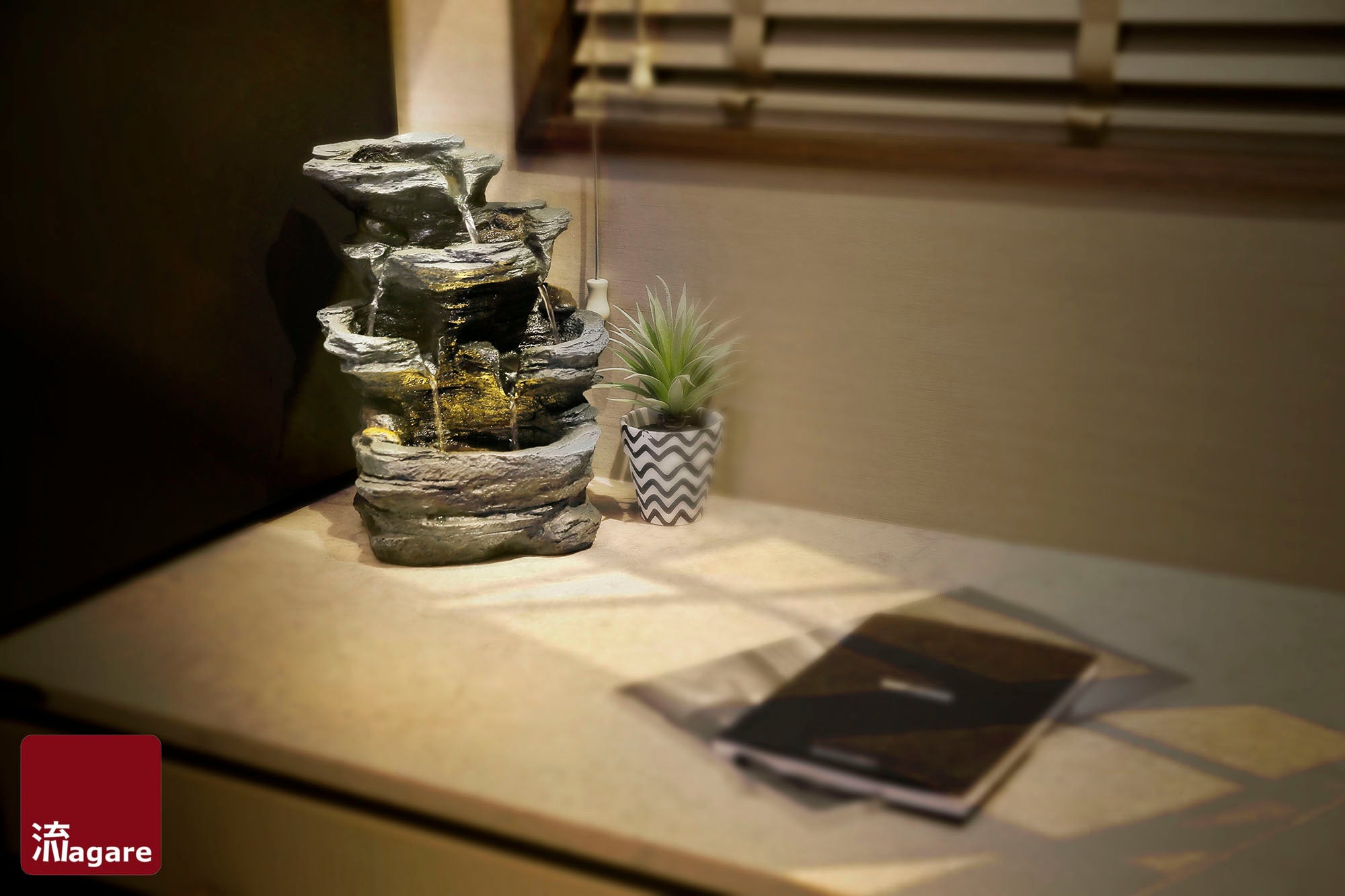 Follow the soothing sound of water as it traverses rocky terrains inspired by the world’s mountain landscapes.